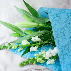 Embossed Non-woven Flower Wrap Tropical Leaves Sky Blue 80gsm Pack 50 (50x70cm)