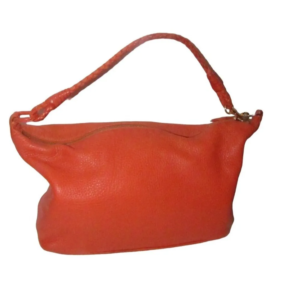 High- end bohemian, RARE, Bottega Veneta, orange leather with a braided leather strap and trim, satchel style, bucket purse