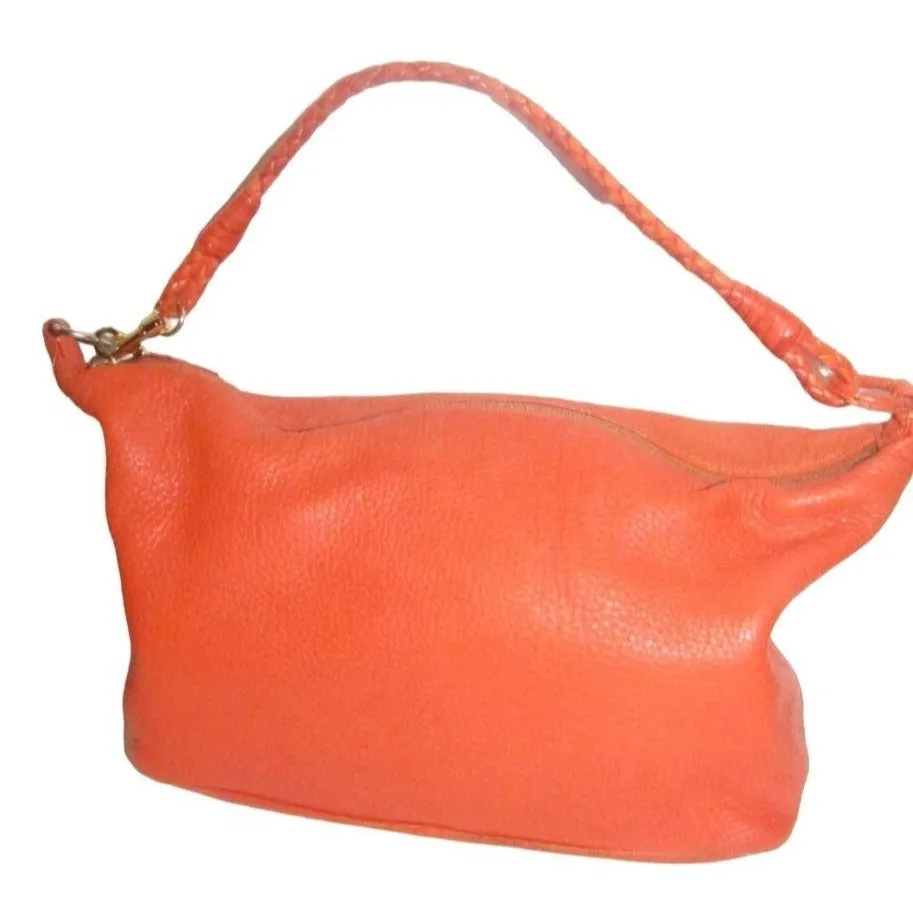 High- end bohemian, RARE, Bottega Veneta, orange leather with a braided leather strap and trim, satchel style, bucket purse