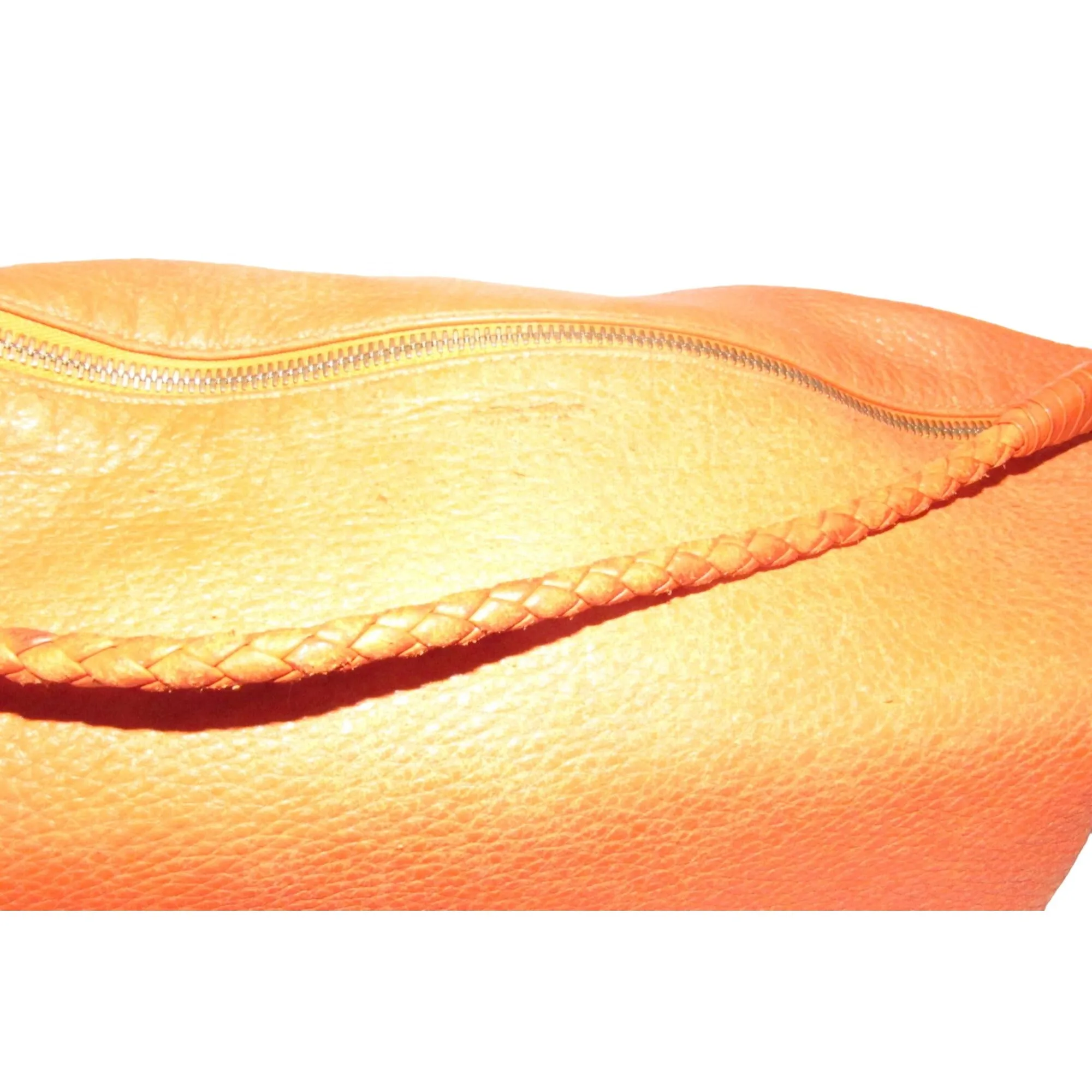 High- end bohemian, RARE, Bottega Veneta, orange leather with a braided leather strap and trim, satchel style, bucket purse